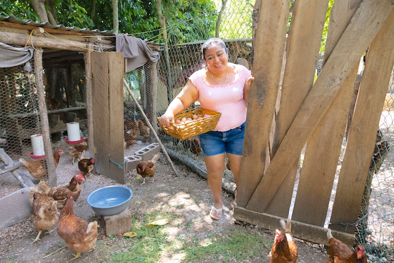 Woman with egg crate smiling