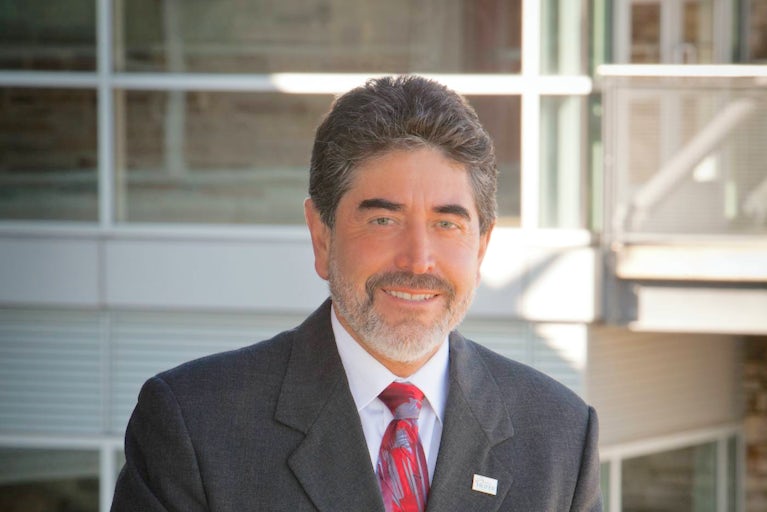 Oscar Casteneda, Senior Vice President of the Americas Programs, professional headshot.