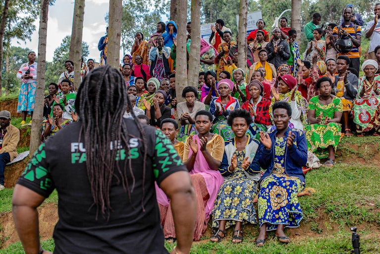 Farmers gather at community ceremony in Rwanda.