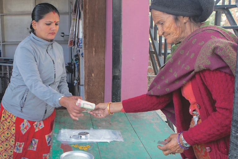 Women exchanging money.