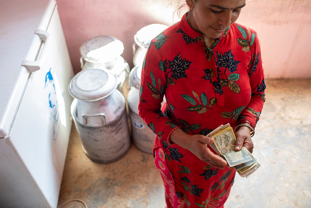 Woman counts her money.